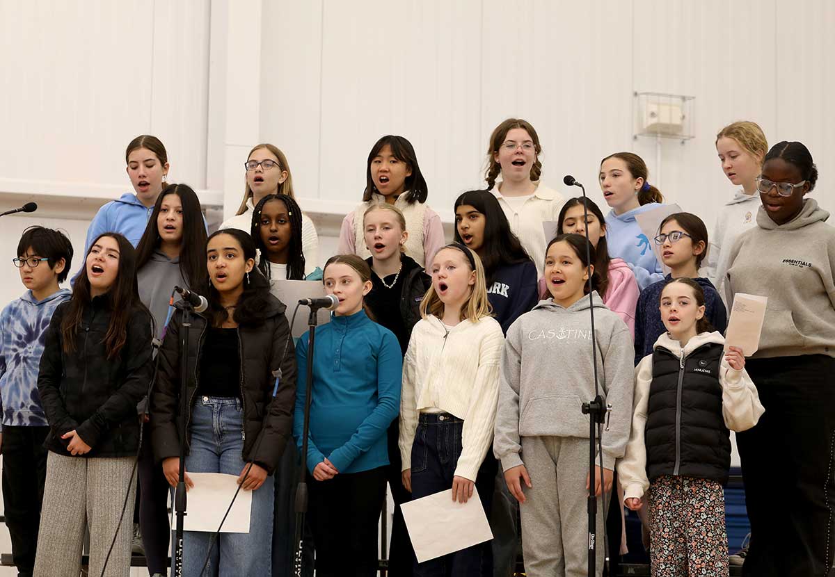 The middle school chorus performs at the annual MLK Assembly